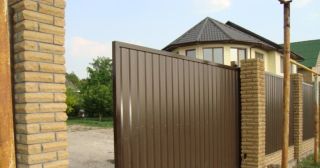 Купить откатные ворота из профнастила Костомукша, цена от 1785 руб.